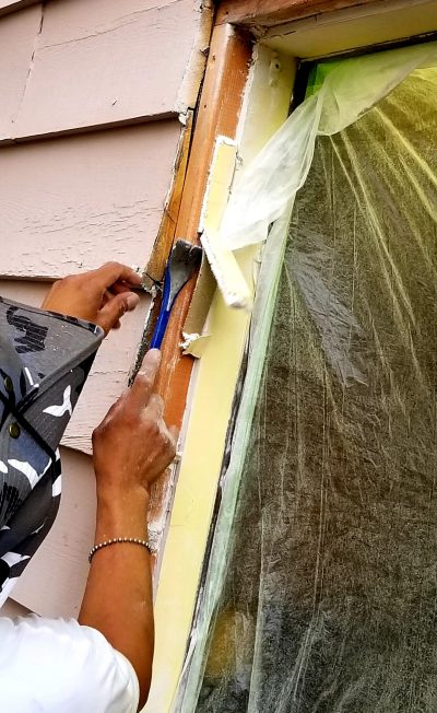 Exterior trim installation on the frame of a door replacement.